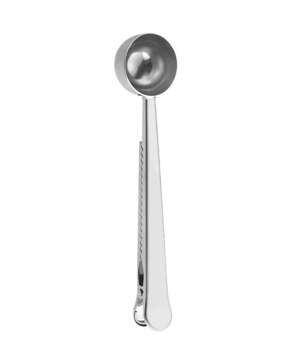 Stainless steel dog supplement scoop with a clip, perfect for WulfJoy healthy pet treats.